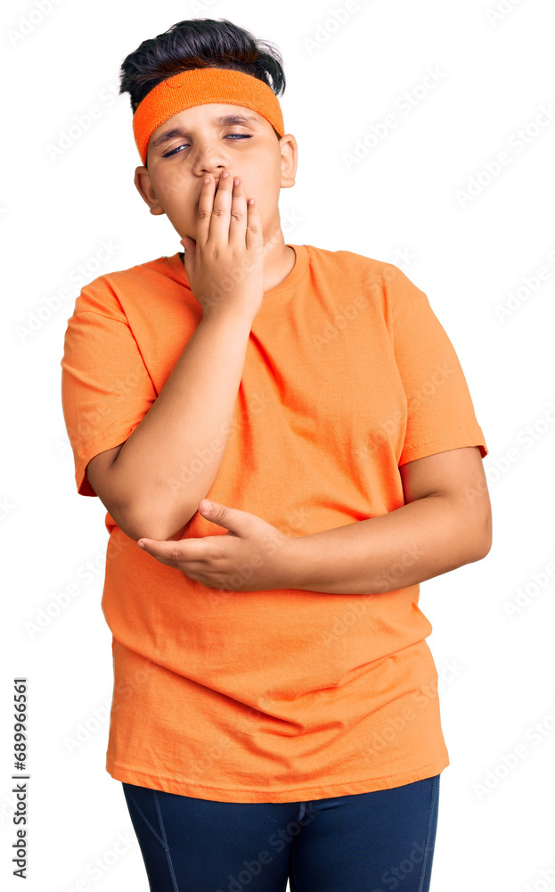 Little boy kid wearing sportswear bored yawning tired covering mouth with hand. restless and sleepiness. Little boy kid wearing sportswear bored yawning tired covering mouth with hand. restless and sleepiness.