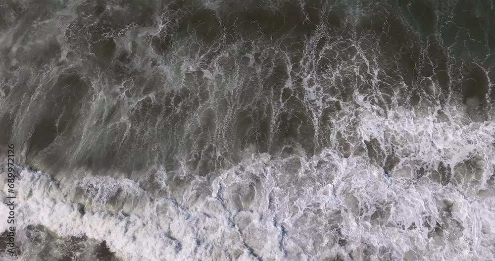 Ocean waves in slow motion seen from above, Seminyak beach, Bali, Indonesia Ocean waves in slow motion seen from above, Seminyak beach, Bali, Indonesia