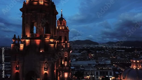 Straight flight of the towers of the cathedral of Morelia, Michoacan, Mexico. photo