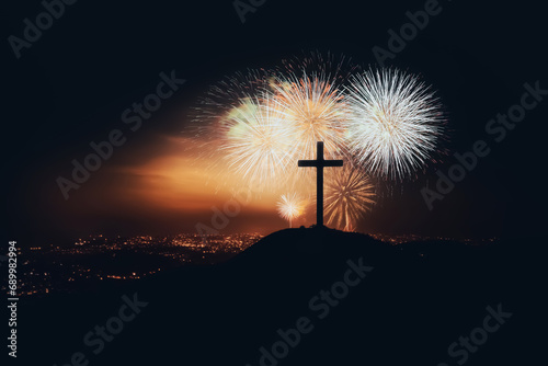 Christmas fireworks festival and fireworks to celebrate the holiday season and New Year, New Year's night cityscape and church cross silhouette
 photo