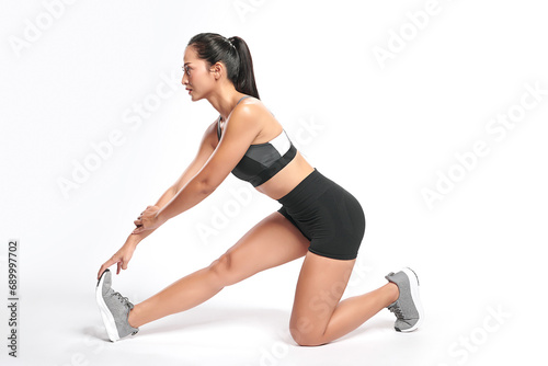 Beautiful young asian sport woman with sportswear ready for exercise on white background, Advertising sportswear and yoga wear, Healthy lifestyle, sport. © kitthanes