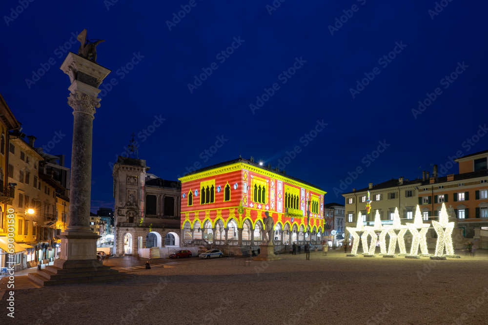 Christmas light decorations projected on the palaces in Udine, Italy