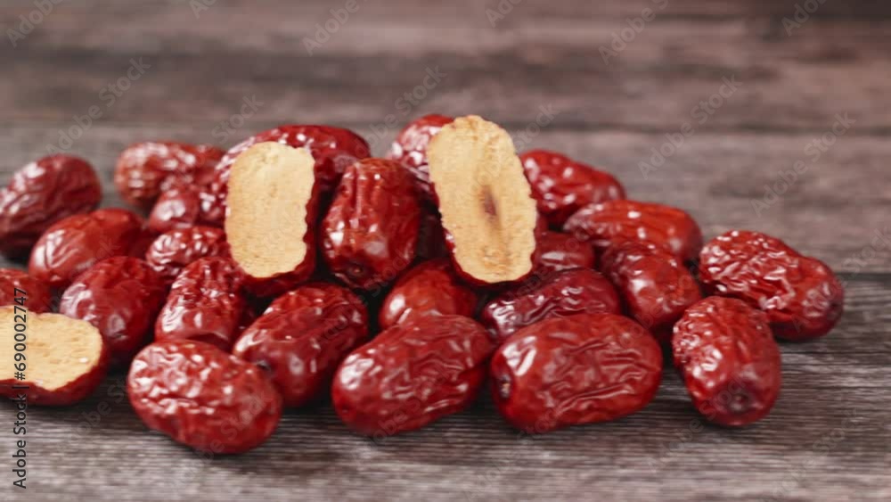 jujube,dried red dates on wooden table jujube,dried red dates on wooden table