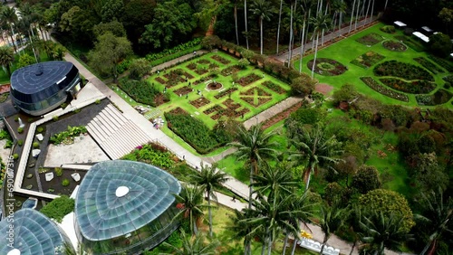 Aerial drone shot of the botanical garden in Bogotà, Colombia.
High view of the scenic glasshouse and garden. José Celestino Mutis Colombia's biggest botanical garden. photo