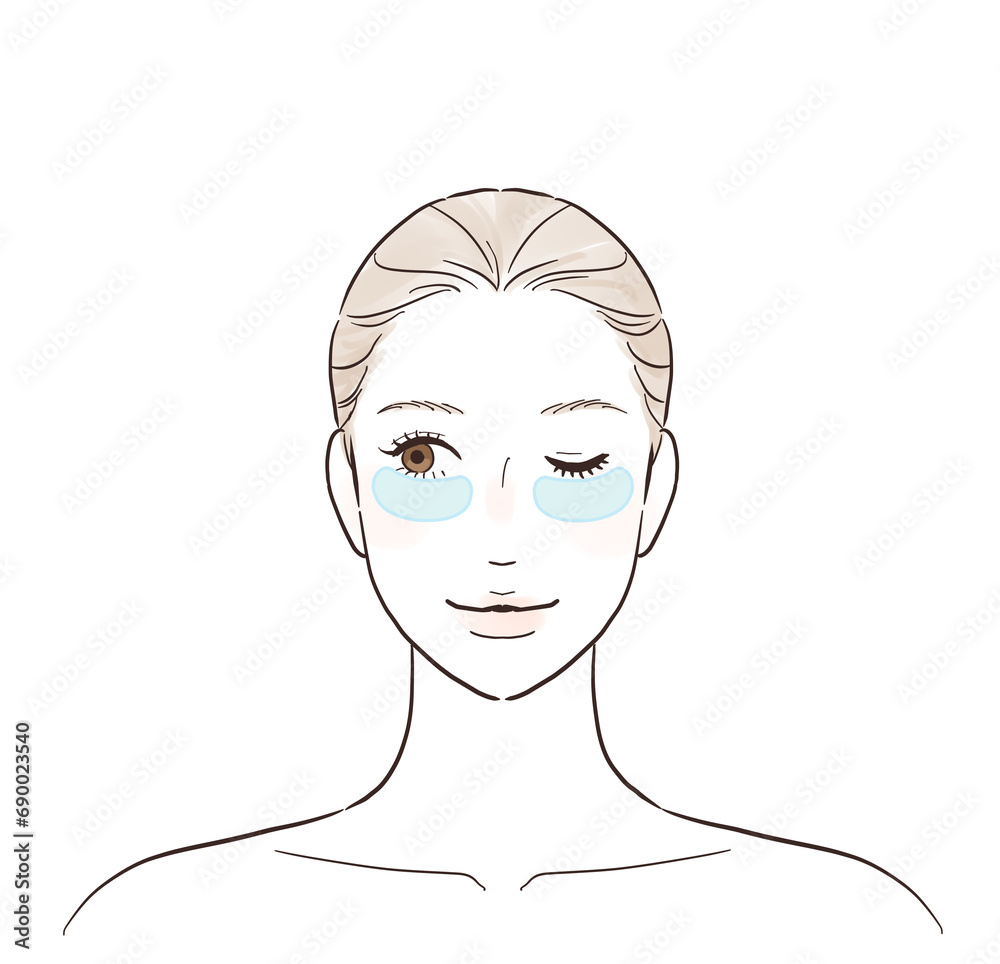 目元に保湿シートを貼る女性
