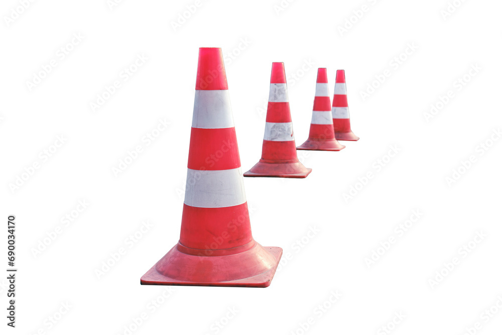Cones block the road due to the ban on travel to the coronavirus quarantine zone, isolated on a white background Cones block the road due to the ban on travel to the coronavirus quarantine zone, isolated on a white background