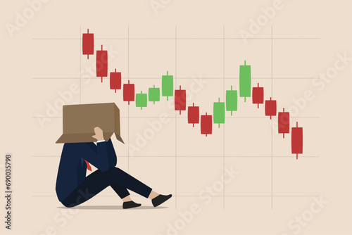 Economic crash, financial crisis caused stock and crypto markets to fall down concept, businessman failed to analyze the movement of candlestick charts.