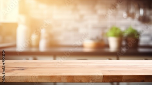 Wooden table with kitchen blur background  © Sim