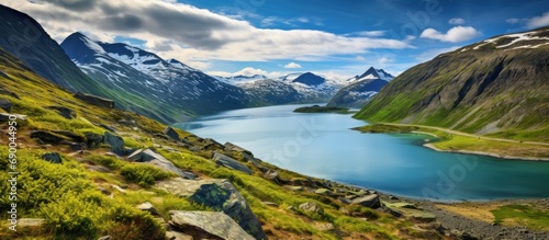 Beautiful scenery of reflection of mountains mirror chain in a small lake.