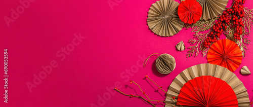 Fototapeta Naklejka Na Ścianę i Meble -  Lunar Chinese New Year concept. Oriental asian style paper fans, traditional decor, minimal concept