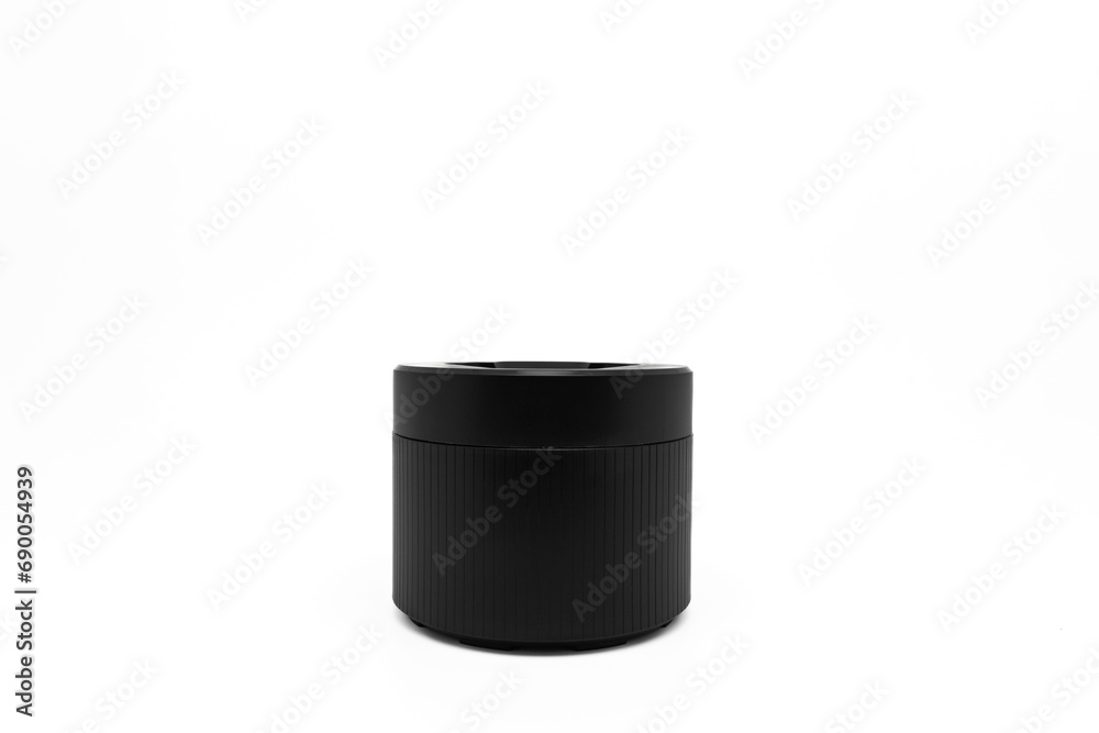 Cleaning pod or cleaning station for electric shaver, isolated on white with copy space. Electric shaver accessories. Side view. Cleaning pod or cleaning station for electric shaver, isolated on white with copy space. Electric shaver accessories. Side view.