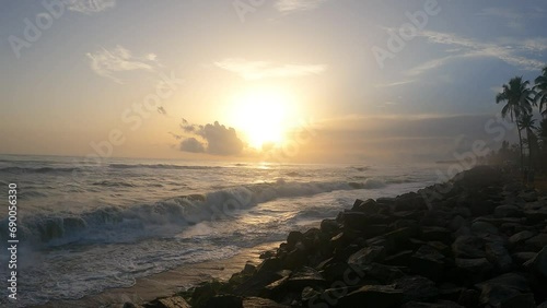 sunset on the kappil beach in kerela photo
