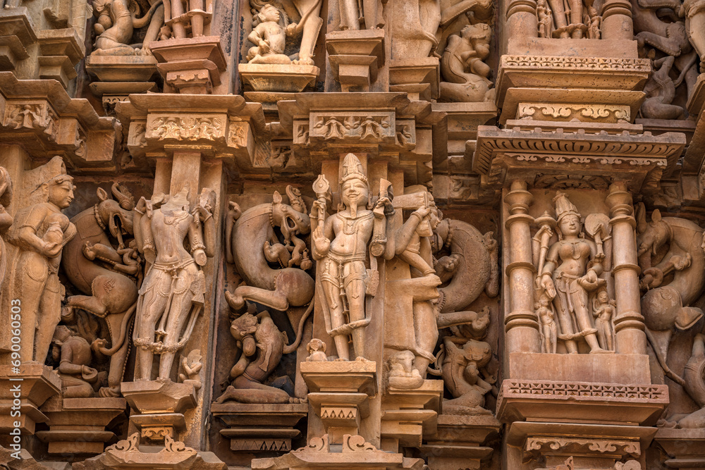 Fototapeta premium The Khajuraho Group of Monuments are a group of Hindu and Jain temples Khajuraho Temple, popular worldwide for its outstanding temples designs and erotic sculpture. It is a UNESCO world Heritage site.