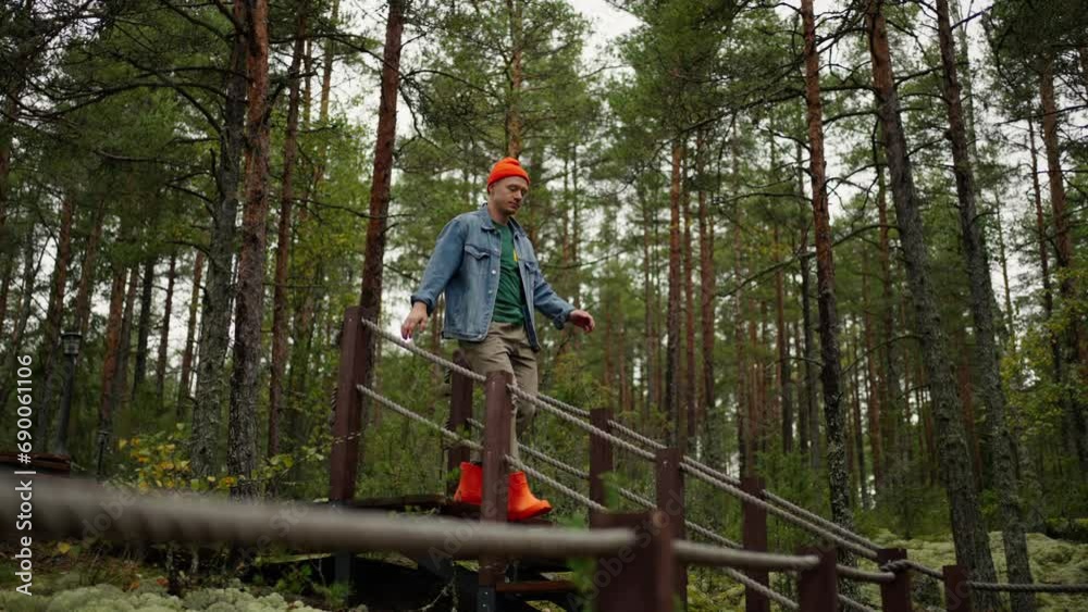 Modern Eco Hotel In Woodland, Man Tourist Walking In Territory Of Resort And Camping In Forest Modern Eco Hotel In Woodland, Man Tourist Walking In Territory Of Resort And Camping In Forest