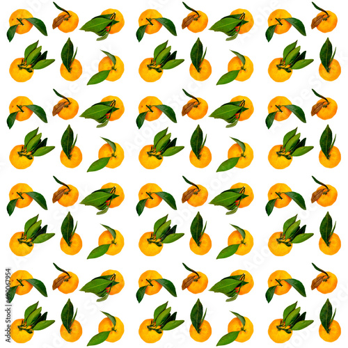 Pattern of many yellow tangerines with green leaves isolated on a white background
