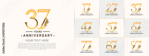 set of anniversary logotype golden and black color and ornament for special celebration event photo