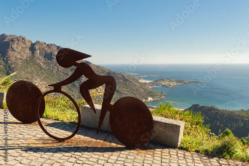 sculpture with sea landscape in the background