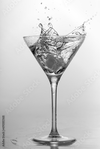 Splash in martini glass  alcohol  frozen motion
