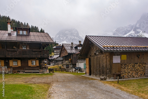 Traditional wooden houses in the historic mountain village of Cima Sappada in Carnia in Udine Province, Friuli-Venezia Giulia, north east Italy © dragoncello