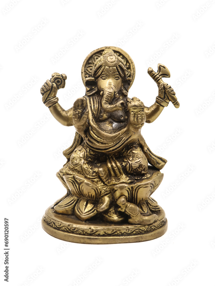 brass statue of ganesha with multiple hands sitting on a lotus with isolated on white background