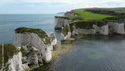 Drone view of Old Harry Rocks, chalk formations at Handfast Point, England, UK photo