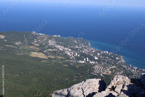 view of the green coastline from above