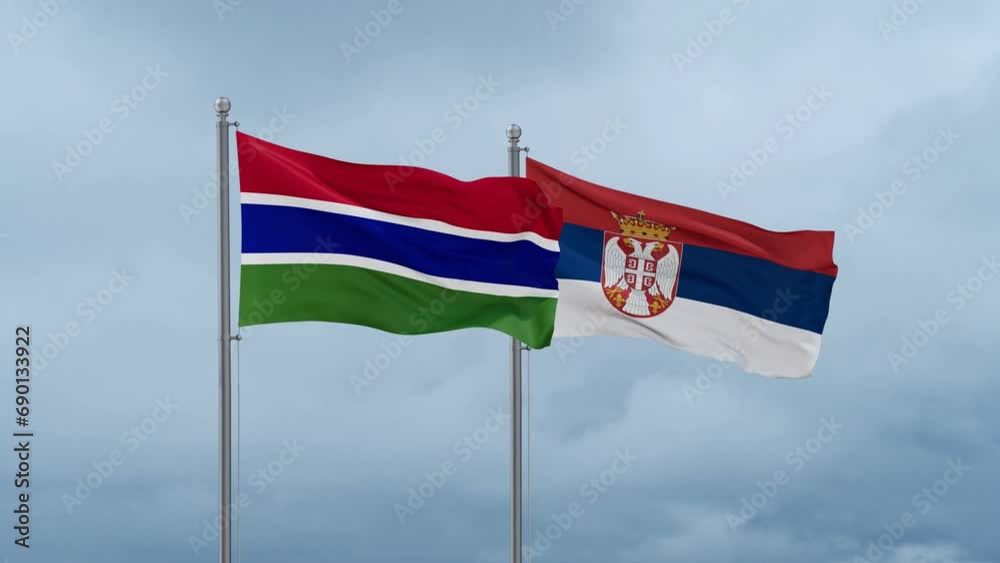 Republic of Serbia and Gambia flag waving together on cloudy sky, endless seamless loop, two country cooperation concept Republic of Serbia and Gambia flag waving together on cloudy sky, endless seamless loop, two country cooperation concept