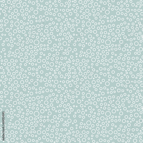 Seamless background with random white bubbles. Abstract ornament. Seamles abstract pattern
