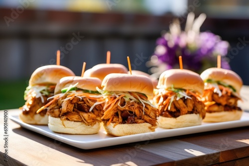 bbq pork sliders presented on outdoor table