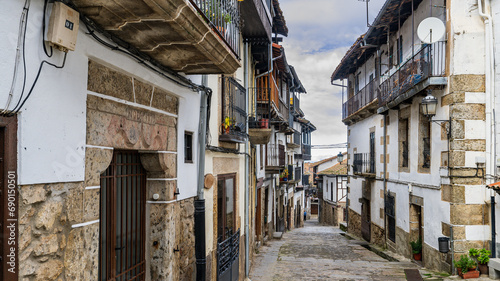 Street and traditional houses of the beautiful town of Candelario, in Salamanca. photo