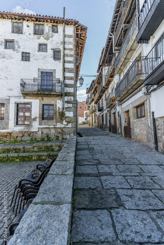 Street and traditional houses of the beautiful town of Candelario, in Salamanca.