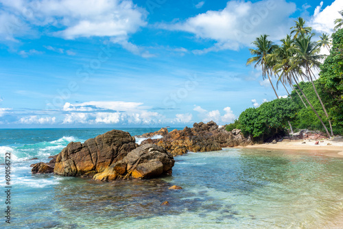 Beautiful Indian Ocean coastline on the island of Sri Lanka, Mirissa. © ArturSniezhyn