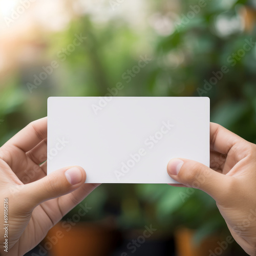 Blank Canvas of Opportunity: Holding a Business Card Ready for Personalized Connections