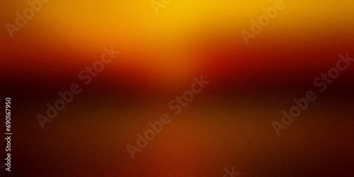 Orange red golden yellow warm glowing wide background.Blurred pattern with noise effect. Grainy website banner desktop, template, digital gradient. Atmosphere of holidays Christmas New Year Halloween