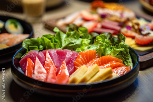 Assorted fresh sushi platter with vibrant colors. Japanese cuisine and gourmet food.