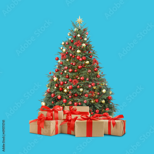 Beautiful Christmas tree with many gift boxes under on light blue background