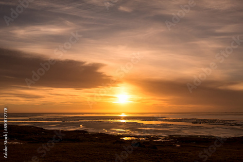 Sunset on iceland beach with beautiful sky