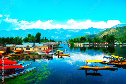  Dal Lake and the beautiful mountain range in the background, in the summer Boat Trip, of city Srinagar Kashmir India.