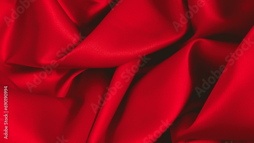 Smooth elegant red silk or satin luxury cloth texture can use as abstract background. Luxurious fabric background design