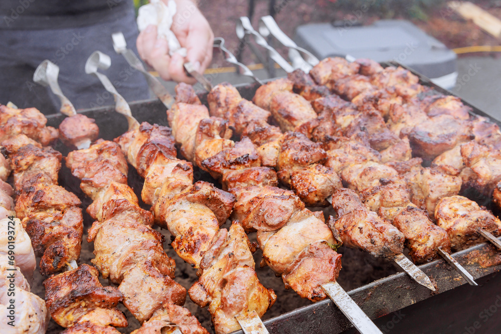 Kebabs cooked outdoors with skewers hot grills in traditional Turkish style