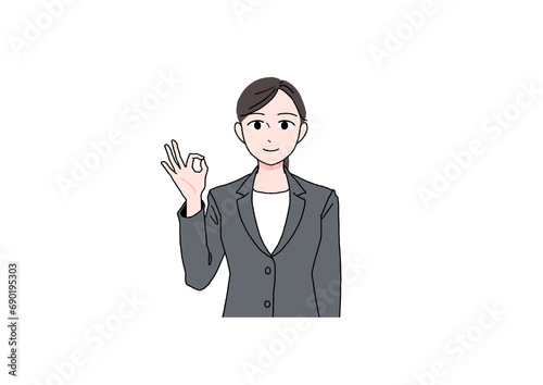 笑顔でOKするスーツの女性