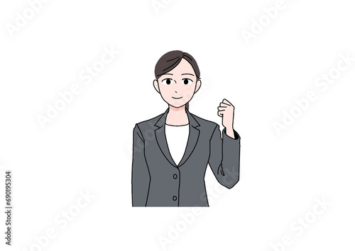 笑顔でガッツポーズするスーツの女性