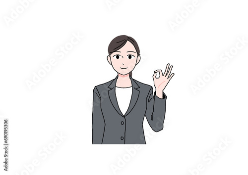 笑顔でOKするスーツの女性