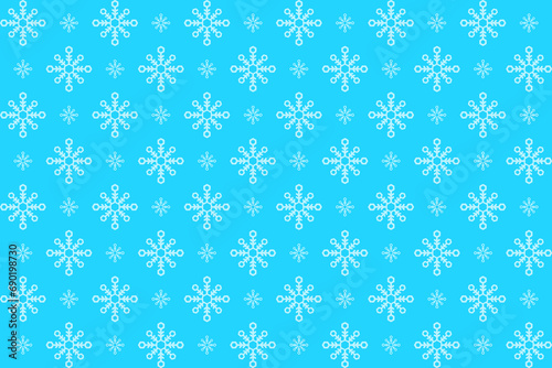 simple and attractive image of a blue background with white snowflakes scattered across it