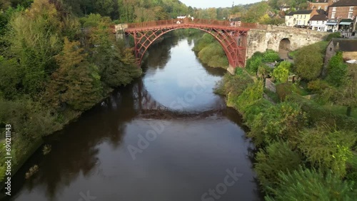 Drone footage of the Iron Bridge crosses River Severn in Ironbridge village in Shropshire, England photo