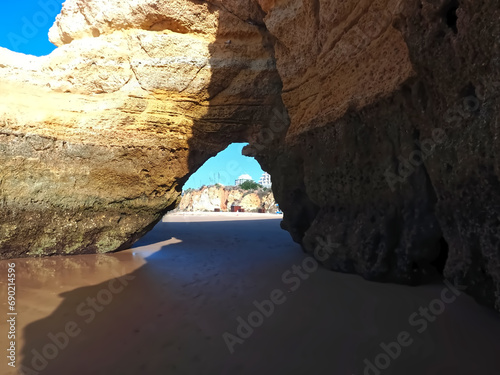 Epic Algarve beach in Portimao with typical red cliffs
