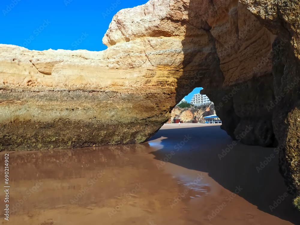 Epic Algarve beach in Portimao with typical red cliffs