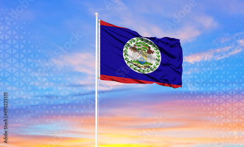 BELIZE San Pedro Ambergris Caye Belizean country flag wave in breeze from flag pole photo