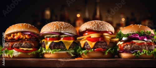 Gourmet tasty burgers with cheese and vegetables selective focus. Website header. Creative Banner. Copyspace image photo