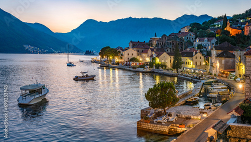 Historic city of Perast in the Bay of Kotor in summer, Montenegro. Evening panoramic view. The Bay of Kotor is the beautiful place on the Adriatic Sea. Perast, Kotor bay, Montenegro. photo